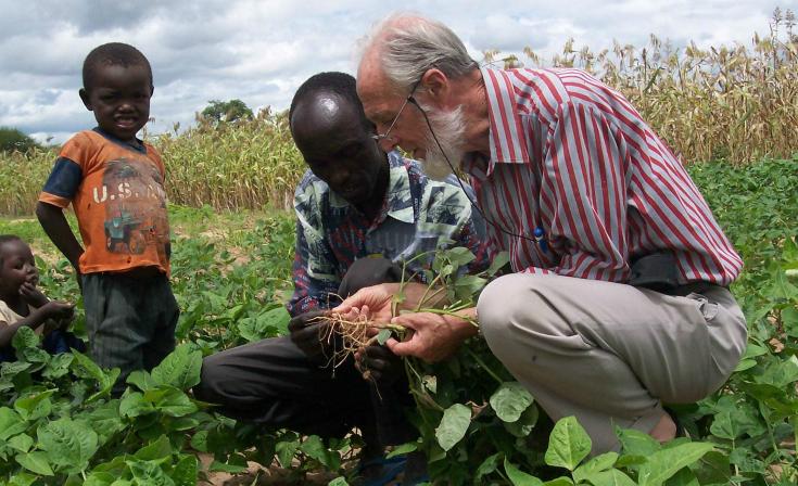 Rev Brian Polkinghorne shares his farming and environmental experience with a farmer and his family in Tanzania.